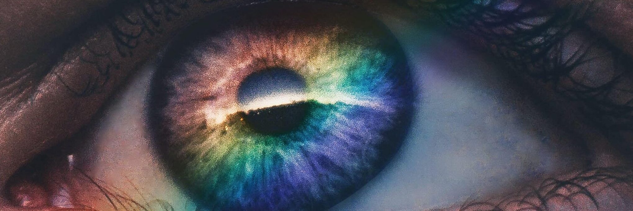 A rainbow reflection over the eye